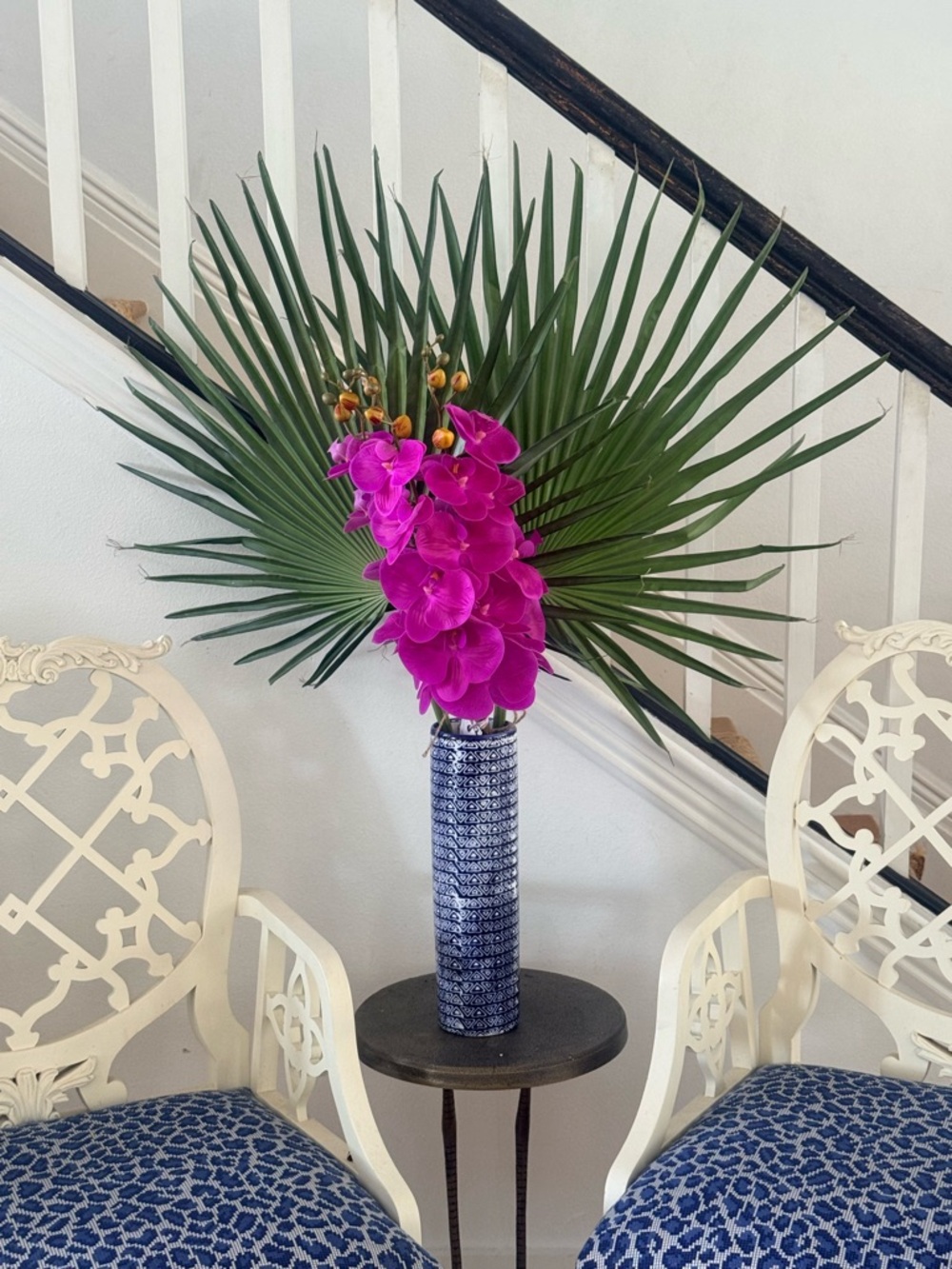 Magenta Orchid and Palm Statement Arrangement in Blue Ceramic Vase